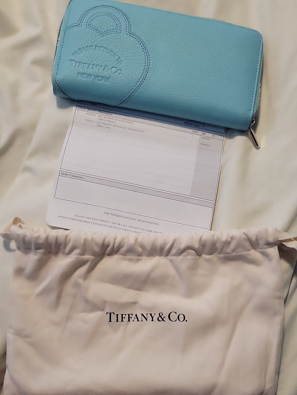 Tiffany & Co. Light Blue Leather Zip Wallet with Embossed Logo